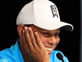 Tiger Woods addresses the media during a press conference after playing in the pro-am round of the Farmers Insurance Open at Torrey Pines Golf Course on Jan. 24, 2018