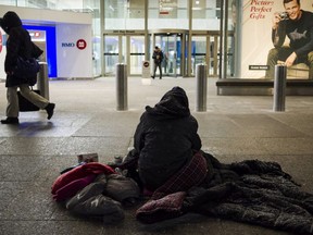 A homeless person is seen in downtown Toronto, on Wednesday, January 3, 2018.