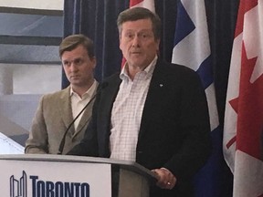 Mayor John Tory, with Councillor Joe Cressy, announces two new warming centres to open in downtown Toronto on Thursday, Jan. 4, 2018, as the city braces for an even deeper freeze.