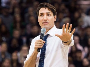 Prime Minister Justin Trudeau answers questions from the public during his town hall meeting in Hamilton, Ont., on Wednesday, Jan. 10, 2018.