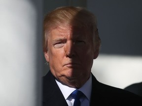 U.S. President Donald Trump stands in the colonnade as he is introduced to speak to March for Life participants and pro-life leaders in the Rose Garden at the White House on Jan. 19, 2018 in Washington, D.C. (Mark Wilson/Getty Images)