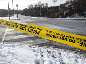 Police tape remains tied to a post at Bayview and Pottery Road where a man died after rolling his vehicle early New Years Day. The man was pronounce dead at the scene on Monday January 1, 2018. Craig Robertson/Toronto Sun/Postmedia Network