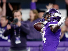 Wide receiver Stefon Diggs of the Minnesota Vikings celebrates the game-winning touchdown against the New Orleans Saints at U.S. Bank Stadium on January 14, 2018 in Minneapolis. (Jamie Squire/Getty Images)
