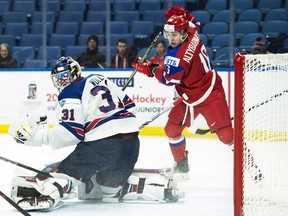 United States goaltender and Maple Leafs prospect Joseph Woll makes a save against Russia on Tuesday. (THE CANADIAN PRESS)