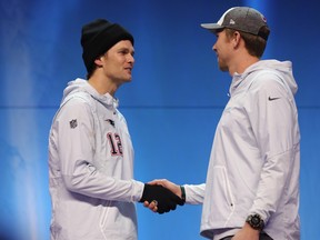 New England Patriots' Tom Brady (left) faces off with Philadelphia Eagles' Nick Foles at this Sunday's Super Bowl. (GETTY IMAGES)