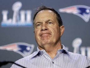 New England Patriots head coach Bill Belichick listens to a question during a news conference earlier this week. (AP PHOTO)