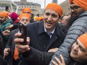 Prime Minister Justin Trudeau greets people at the Toronto's Khalsa Day parade,on April 30, 2017. (The Canadian Press)