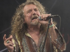 Robert Plant is pictured while performing  during the summer of 2014 at the Glastonbury music festival, in England. (AP PHOTO)