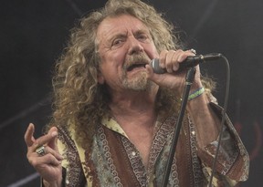 Robert Plant is pictured while performing  during the summer of 2014 at the Glastonbury music festival, in England. (AP PHOTO)