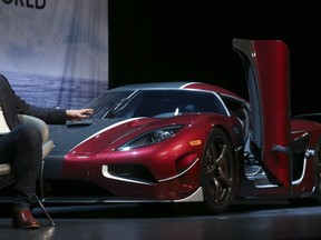 Christian von Koenigsegg,  founder and CEO of Swedish high-performance automobile manufacturer Koenigsegg, displays the $2.5 million Agera RS. (JACK BOLAND, Toronto Sun)