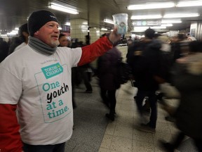 Steve Doherty, executive director with Youth without shelter taking part in Tokens4Change day (DAVE ABEL, Toronto Sun)