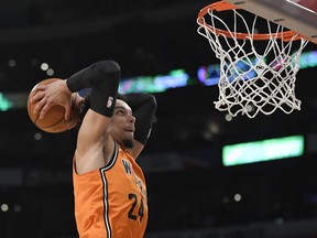 World Team's Dillon Brooks, of the Memphis Grizzlies, dunks during the NBA all-star rising stars game on Friday. (AP PHOTO)