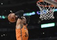 World Team's Dillon Brooks, of the Memphis Grizzlies, dunks during the NBA all-star rising stars game on Friday. (AP PHOTO)