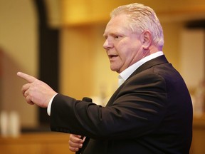 Ontario PC leadership candidate Doug Ford addresses supporters at a rally in Sudbury, Ont. on Tuesday February 27, 2018. Gino Donato/Postmedia Network