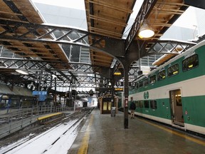 A passenger steps on to the train platform at Union Station. (Jack Boland, Toronto Sun)