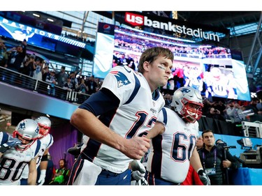 Tom Brady #12 of the New England Patriots takes the field prior to Super Bowl LII against the Philadelphia Eagles at U.S. Bank Stadium on February 4, 2018 in Minneapolis, Minnesota.