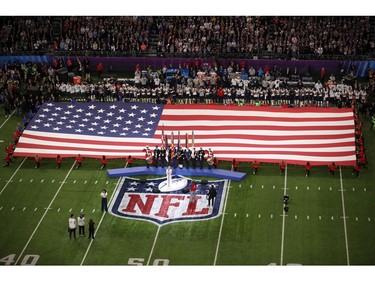 Pink sings the national anthem prior to Super Bowl LII between the New England Patriots and the Philadelphia Eagles at U.S. Bank Stadium on February 4, 2018 in Minneapolis, Minnesota.