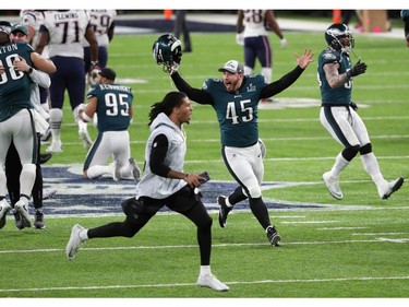 Rick Lovato #45 of the Philadelphia Eagles runs on the field after defeating the New England Patriots in Super Bowl LII at U.S. Bank Stadium on February 4, 2018 in Minneapolis, Minnesota. The Philadelphia Eagles defeated the New England Patriots 41-33.
