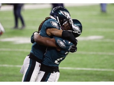 Ronald Darby #41 and  Corey Graham #24 of the Philadelphia Eagles celebrate winning Super Bowl LII against the New England Patriots 41-33 at U.S. Bank Stadium on February 4, 2018 in Minneapolis, Minnesota.