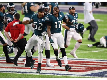 Alshon Jeffery #17 and Najee Goode #52 of the Philadelphia Eagles  celebrate defeating the New England Patriots 41-33 in Super Bowl LII at U.S. Bank Stadium on February 4, 2018 in Minneapolis, Minnesota.