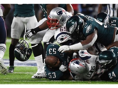 Nigel Bradham (53) of the Philadelphia Eagles loses his helmet during Super Bowl LII against the New England Patriots at US Bank Stadium in Minneapolis, Minnesota, on February 4, 2018.