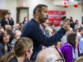 A heckler during an Anti-Racism Town Hall held in the basement of the Grant African Methodist Episcopal Church near Gerrard St. E. and Woodbine Ave. in Toronto, Ont. on Thursday February 22, 2018.