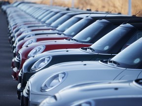 Cars at an auto dealership. (AP Photo/David Zalubowski)