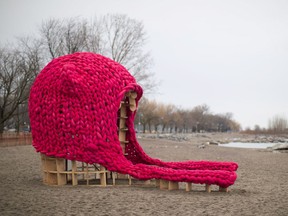 A pink toque inspired"'Pussy Hut" is pictured on Toronto's beach Wednesday February 21, 2018. A massive pink toque has taken over a stretch of a Toronto beach a year after thousands of protesters donned bright pink hats to protest gender inequality.