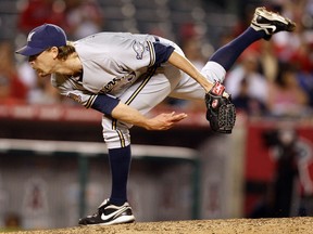 Milwaukee Brewers reliever John Axford delivers a pitch against the Los Angeles Angels in Anaheim, Calif., on Tuesday, June 15, 2010. (AP Photo/Christine Cotter)