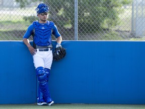 Toronto Blue Jays catcher Luke Maile waits for the pitchers to arrive at spring training in Dunedin, Florida. THE CANADIAN PRESS/Frank Gunn