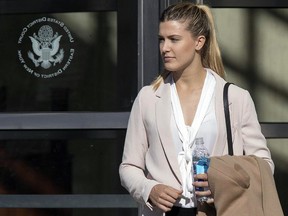 Tennis star Eugenie Bouchard leaves Brooklyn Federal court, Wednesday, Feb. 21, 2018, in New York. (AP Photo/Mary Altaffer)