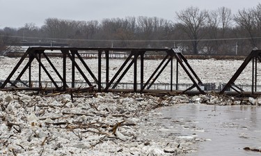 The Grand River, choked with ice and debris is as high as the former CNR bridge, now a pedestrian bridge. Police have closed the Lorne Bridge, as well as the Veterans Memorial Parkway bridge, and issued evacuation orders for several areas of Brantford. The city has declared a state of emergency as levels of the Grand River have risen significantly and are expected to peak at 2:00 p.m. today. Brian Thompson/Brantford Expositor/Postmedia Network