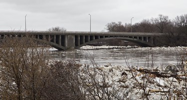 Levels of the Grand River Street are quite high flowing beneath the Lorne Bridge in Brantford, Ontario on Wednesday morning, February 21, 2018.. The city has declared a state of emergency as levels of the Grand River have risen significantly and are expected to peak at 2:00 p.m. today, and several areas of the city are being evacuated. Brian Thompson/Brantford Expositor/Postmedia Network