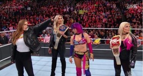 Ronda Rousey, far left, let it be known she plans to go to the top of the WWE. WWE/TWITTER