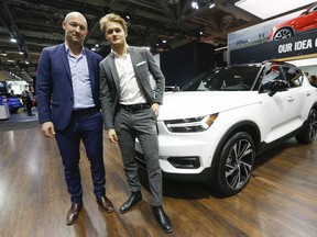 Toronto Maple Leafs forward William Nylander (R) poses with his dad former NHLer Michael in front of his new XC 40 Volvo at the 2018 Canadian International AutoShow held at the Metro Toronto Convention Centre on Thursday February 15, 2018. Jack Boland/Toronto Sun/Postmedia Network