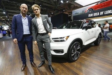 Toronto Maple Leafs forward William Nylander (R) poses with his dad former NHLer Michael in front of his new XC 40 Volvo at the 2018 Canadian International AutoShow held at the Metro Toronto Convention Centre on Thursday February 15, 2018. Jack Boland/Toronto Sun/Postmedia Network