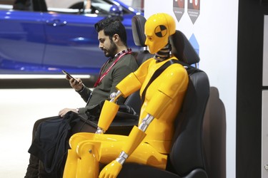 Taking a break at the 2018 Canadian International AutoShow held at the Metro Toronto Convention Centre from Feb 16-25 on Thursday February 15, 2018. Jack Boland/Toronto Sun/Postmedia Network