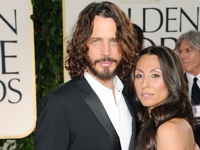 Musician Chris Cornell (L) and wife Vicky Karayiannis arrive at the 69th Annual Golden Globe Awards held at the Beverly Hilton Hotel on January 15, 2012 in Beverly Hills, California. (Jason Merritt/Getty Images)