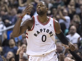 Toronto Raptors forward CJ Miles (0) celebrates hitting a three point shot against the New York Knicks in Toronto on Friday, November 17, 2017. (THE CANADIAN PRESS/Chris Young)