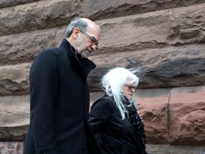 Ex-Ontario premier Dalton McGuinty’s chief of staff David Livingston arrives with his wife Anne Grittani for his sentencing at court in Toronto on Monday, Feb. 26, 2018. Livingston was convicted of illegally destroying documents related to the costly cancellation of two gas plants before the 2011 provincial election. THE CANADIAN PRESS/Colin Perkel