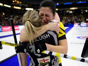 Manitoba second Jill Officer, left, hugs her niece Wild Card lead Kristin MacCuish after defeating her to take the win at the Scotties Tournament of Hearts in Penticton, B.C., on Feb. 4, 2018