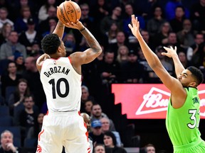 Toronto Raptors' DeMar DeRozan  shoots over Minnesota Timberwolves' Karl-Anthony Towns in NBA action on Jan. 20, 2018
