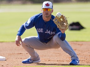 Toronto Blue Jays third baseman Josh Donaldson fields a ground ball during spring training in Dunedin, Fla. on Tuesday, February 20, 2018. (THE CANADIAN PRESS/Frank Gunn)