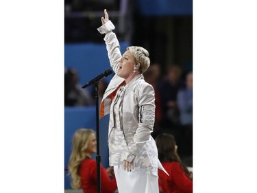 Pink performs the National Anthem, before the NFL Super Bowl 52 football game between the Philadelphia Eagles and the New England Patriots, Sunday, Feb. 4, 2018, in Minneapolis.