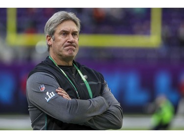 Philadelphia Eagles head coach Doug Pederson watches his team warm up before the NFL Super Bowl 52 football game against the New England Patriots Sunday, Feb. 4, 2018, in Minneapolis.