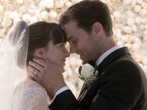 Dakota Johnson and Jamie Dornan in "Fifty Shades Freed." Doane Gregory, Universal Pictures