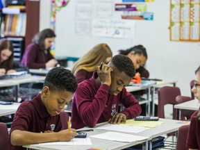 Grade 7 math class at School Secondary Catholic Saint-Charles-Garnier in Whitby, Ont. on Thursday February 15, 2018. School Secondary Catholic Saint-Charles-Garnier is the top improving school in the GTA in this year's Fraser Institute Secondary School Report Card.