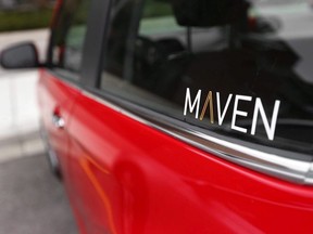 The Maven logo on a General Motors car-sharing service automobile is shown in Ann Arbor, Mich., on April 27, 2016. General Motors Co. is bringing its Maven car-sharing business to Canada for the first time as part of the Detroit-based company's broader strategy for navigating through a rapidly changing automotive world. Toronto will be the first city outside of the United States to offer GM's Maven City app-driven service, which has grown rapidly to 17 American cities since it was launched two years ago in New York City.