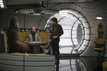 Joonas Suotamo is Chewbacca, Woody Harrelson is Beckett and Alden Ehrenreich is Han Solo in SOLO: A STAR WARS STORY.