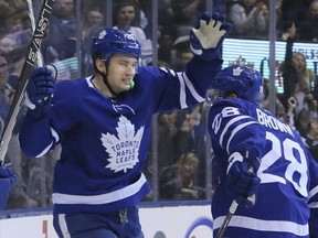 Toronto Maple Leafs James van Riemsdyk and Connor Brown celebrate a goal against the Tampa Bay Lightning at the Air Canada Centre  on Feb. 12, 2018.